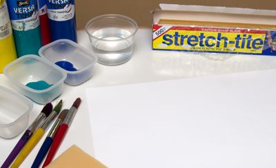 Materials needed for cling film painting: cling film, brushes, sponges, paint, paper and water