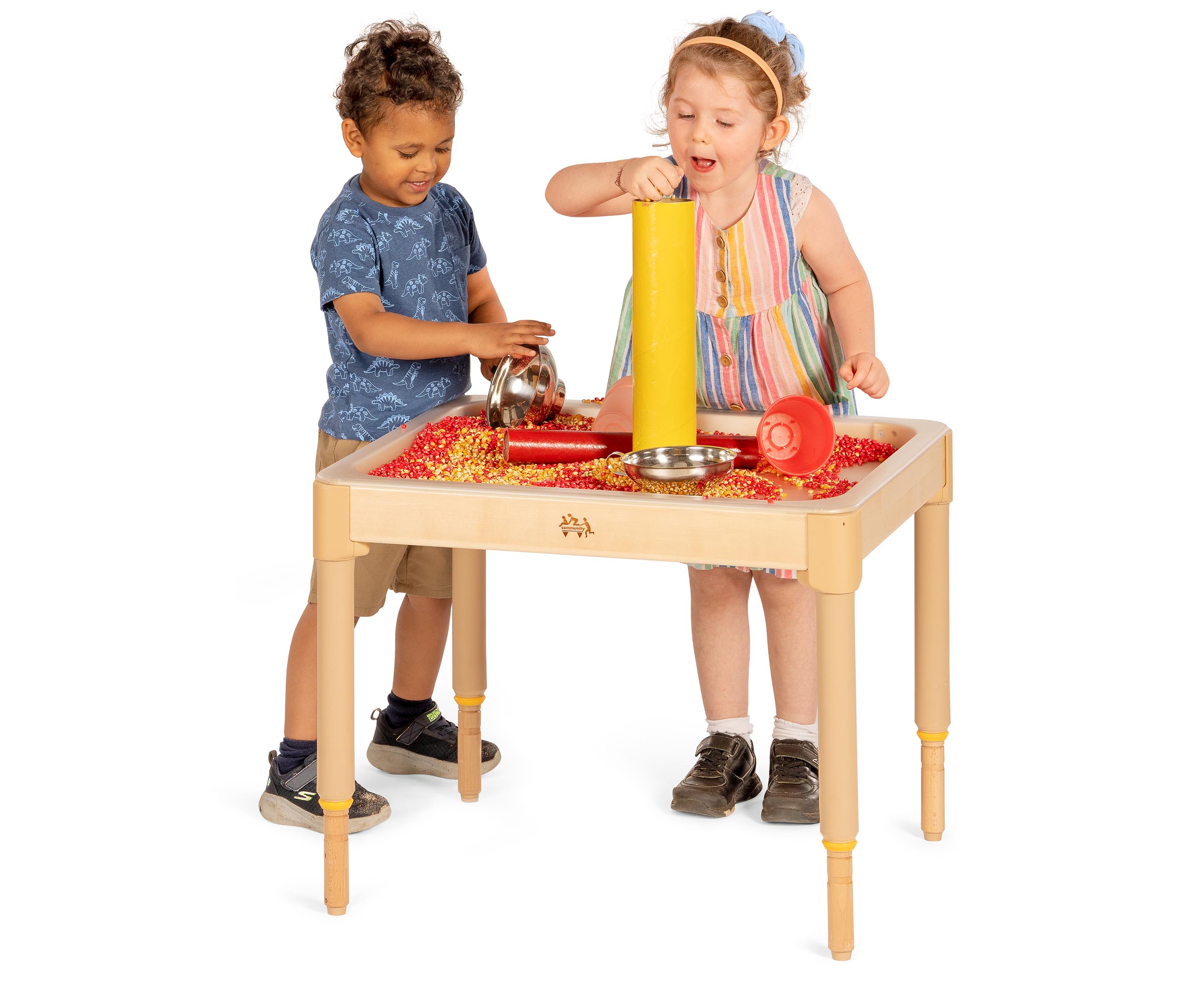 A toddler girl and boy playing with sensory material in the Activity tray.